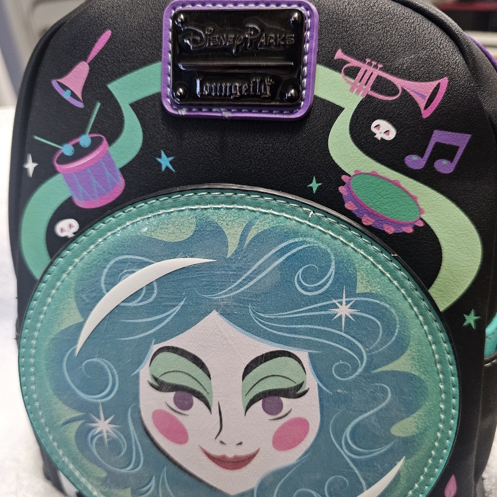 Loungefly Haunted Mansion Madame Leota Black and Teal Backpack Glows in the dark